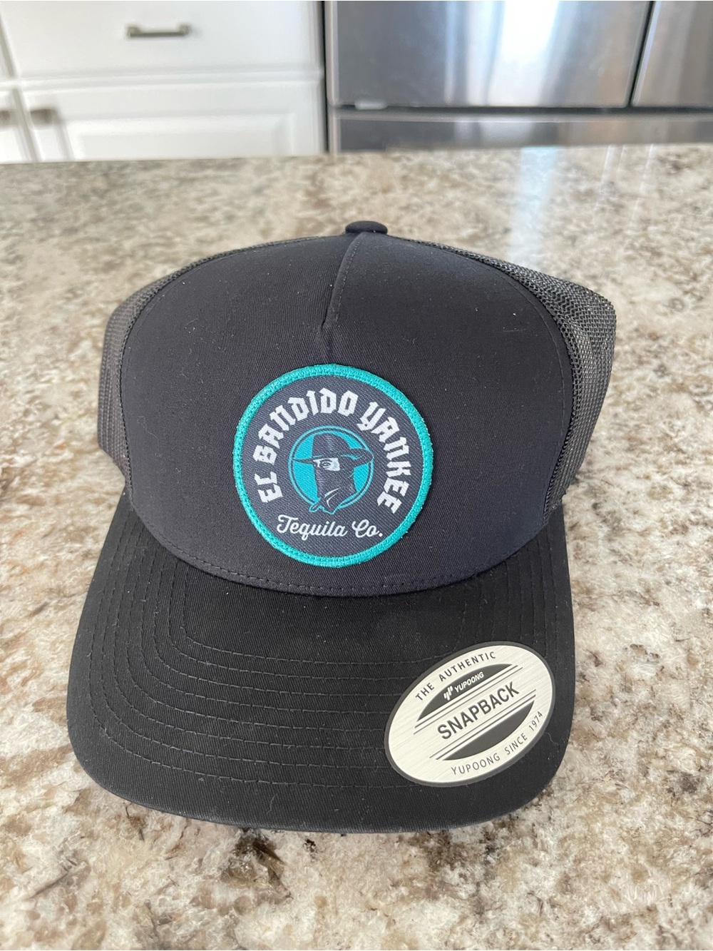 El Bandido Yankee Tequila Co. Black Trucker Hat